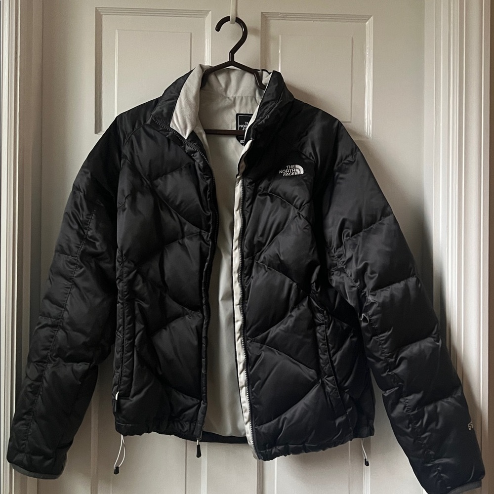North Face black grey puffer. 
Very good condition, minimal wear.